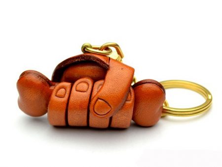 A BONE IN HAND LEATHER KEYCHAIN VANCA